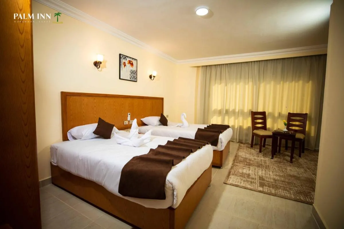 Image 1 of Palm Inn Suites Hotel