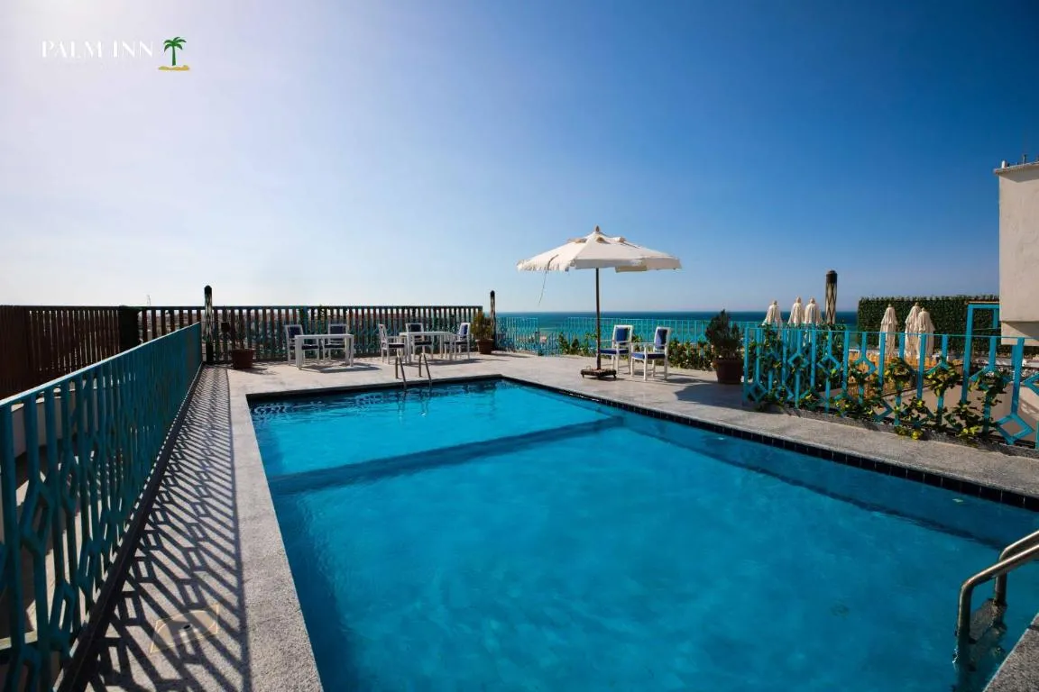 Image of Palm Inn Suites Hotel